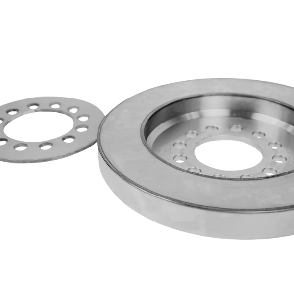 Our viscous torsional damper is a design that consists of a free rotation inertia ring surrounded by a viscous silicone fluid enclosed in a laser welded, sealed housing. When crankshaft torsional vibrations occur, the outer housing of the damper reacts with the crankshaft, twisting as it rotates, while the inertia ring attempts to rotate at a constant speed. This relative motion between the inertia ring and housing causes the inertia ring to shear the silicone fluid, which reduces the destructive torsional vibrations of the crankshaft. When left unchecked, these vibrations may lead to a cracked or broken crankshaft, valve train problems, and premature bearing wear.